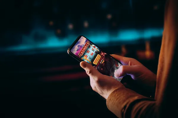 A close-up shot of golden coins falling around a spinning roulette wheel, representing immersive casino action at 2777DET.