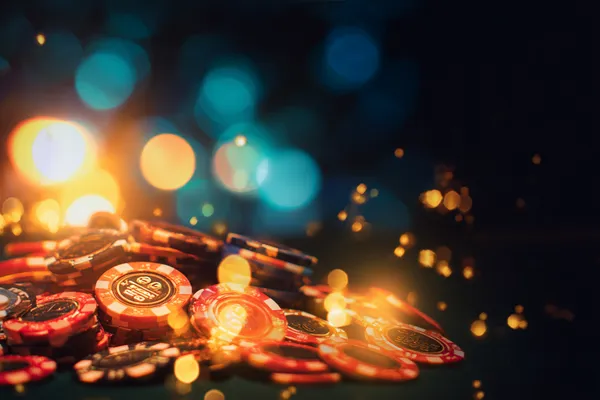 A confident dealer surrounded by casino chips inviting players to access their 2777DET account, reflecting quick and easy login options.